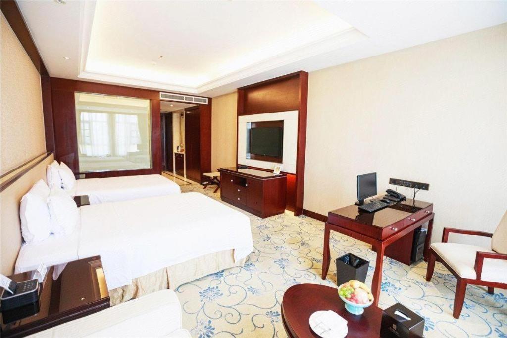 Linyi Blue Horizon International Hotel Yi He Екстер'єр фото