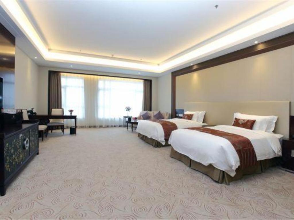 Linyi Blue Horizon International Hotel Yi He Екстер'єр фото