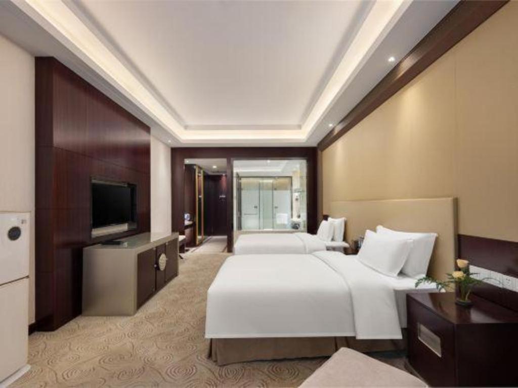 Linyi Blue Horizon International Hotel Yi He Екстер'єр фото